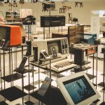 The Evolution of Sustainability: From Cultural Ideal to Strategic Necessity Showcase of vintage electronics in a modern museum setting.