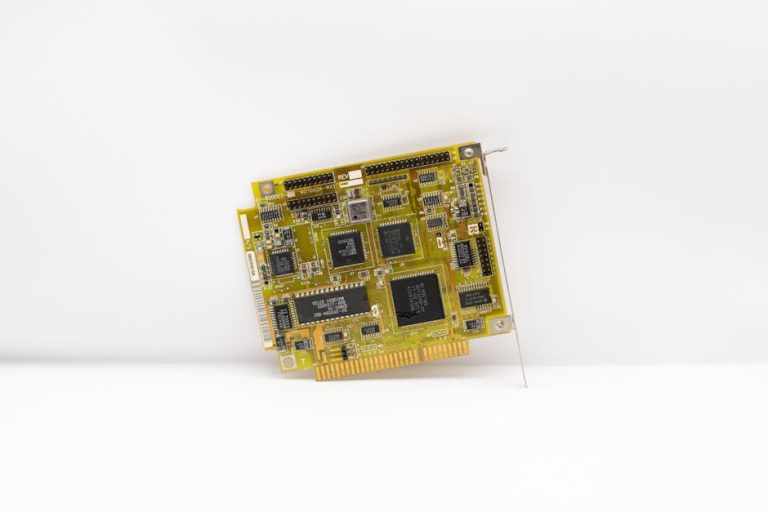 Antique circuit board showcasing vintage computing technology, isolated on a white background.