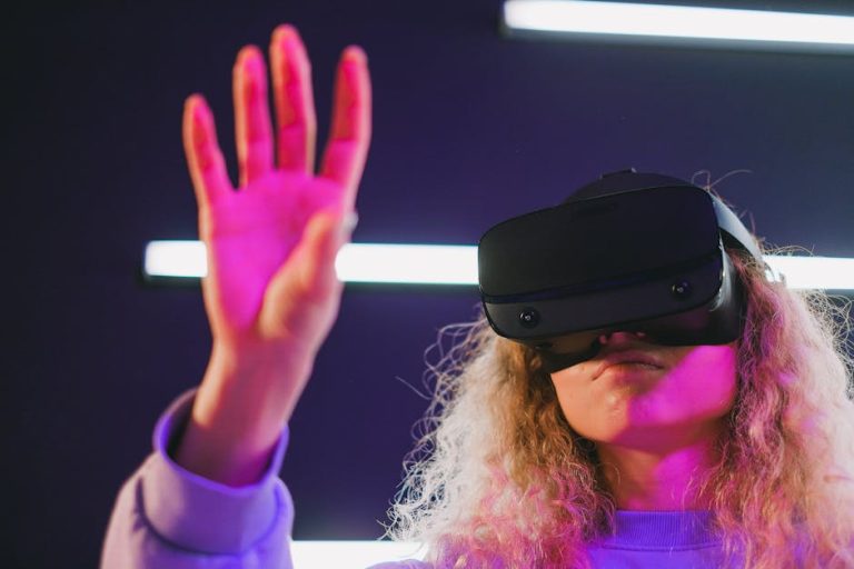 A woman engaged in virtual reality, wearing a headset and interacting with the virtual environment.