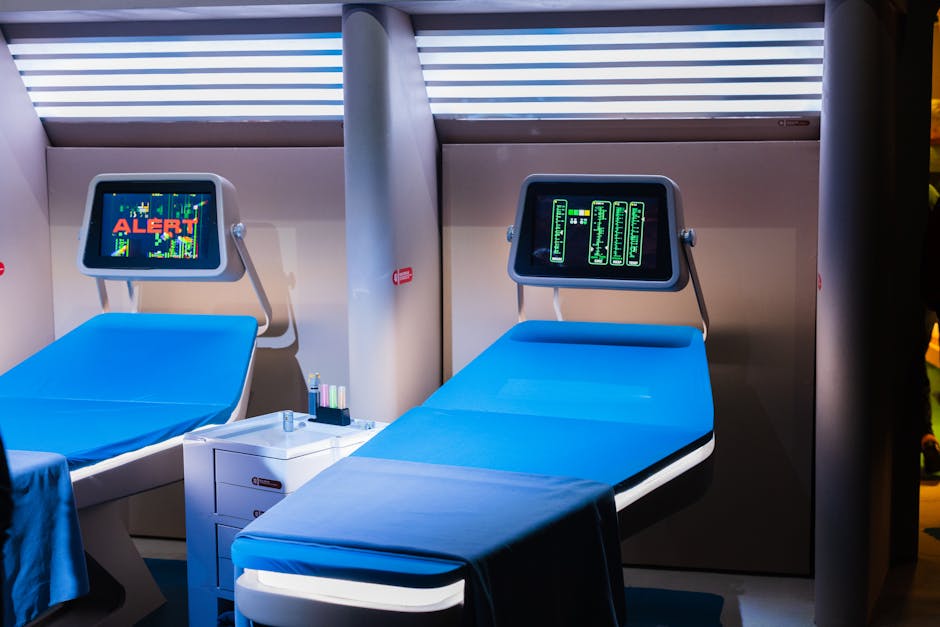 A modern hospital room featuring advanced medical equipment with digital displays.