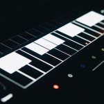 Top view of a modern glowing digital music interface with soft keys, perfect for audio and video production visuals.