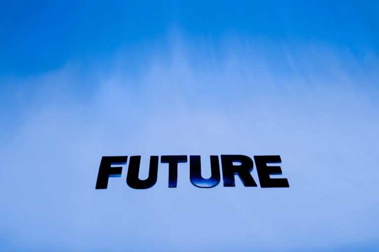 The word 'Future' in bold letters against a bright blue abstract background.