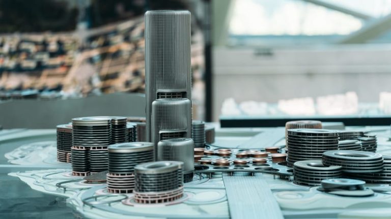 Explore a detailed futuristic city model with towering skyscrapers and modern urban design.
