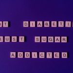 The Neurobiology of Addiction: A New Strategic Frontier for Leaders Scrabble tiles spell out a humorous message on a vivid purple background, highlighting sugar addiction.