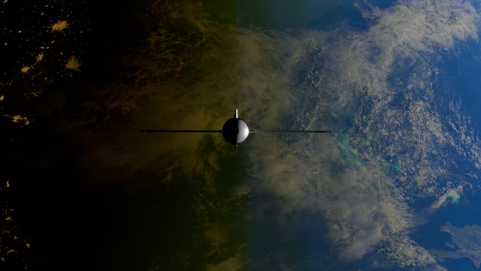 A satellite orbiting Earth showcasing contrasts between ocean and land from space.