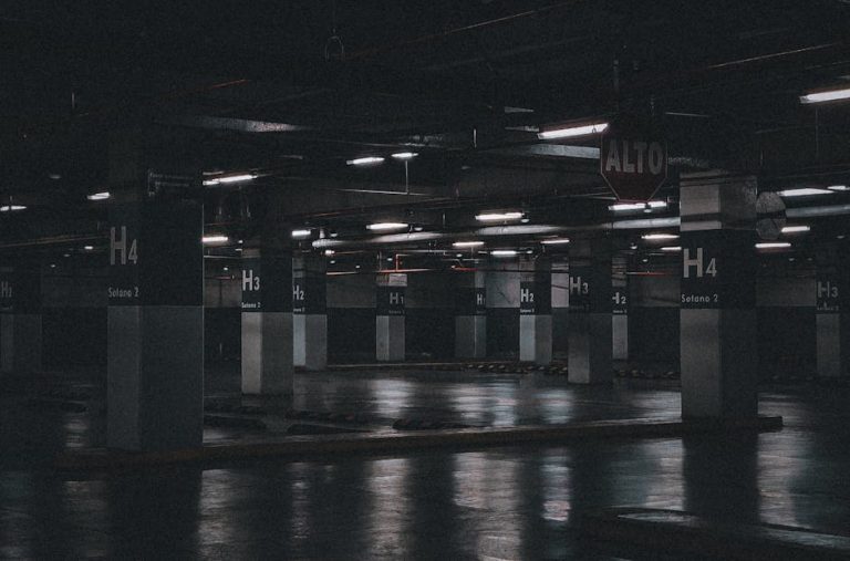 Moody view of an empty underground parking lot showcasing industrial urban design in Tegucigalpa, Honduras.