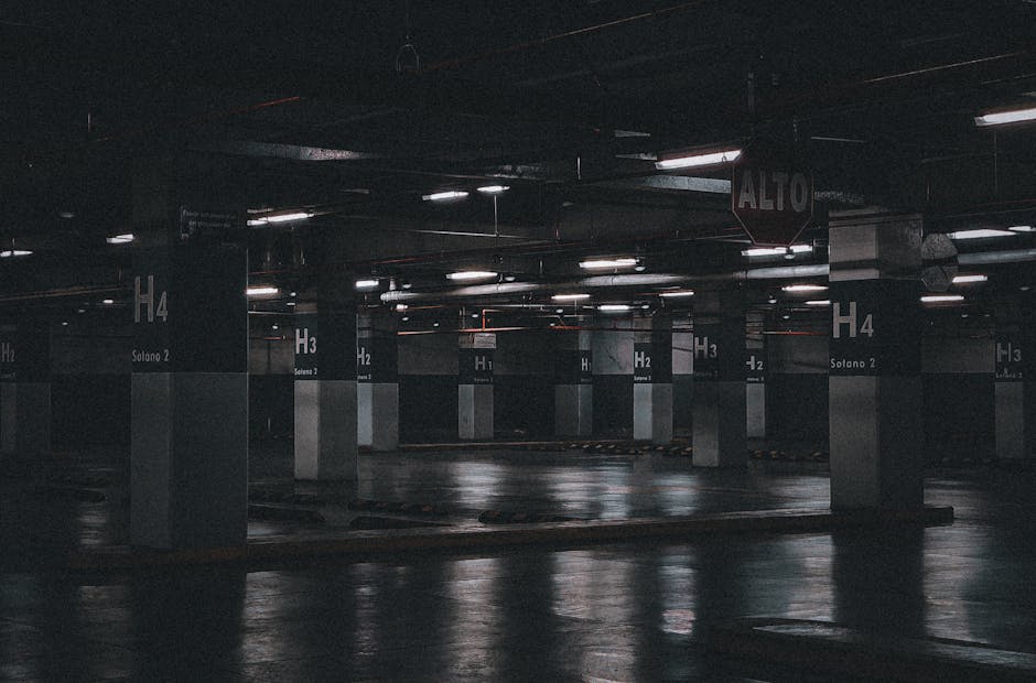 Moody view of an empty underground parking lot showcasing industrial urban design in Tegucigalpa, Honduras.