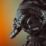 The Stoic Operator: Integrating Spiritual Discipline into Leadership Close-up of a tactical helmet equipped with night vision gear, emphasizing technology.