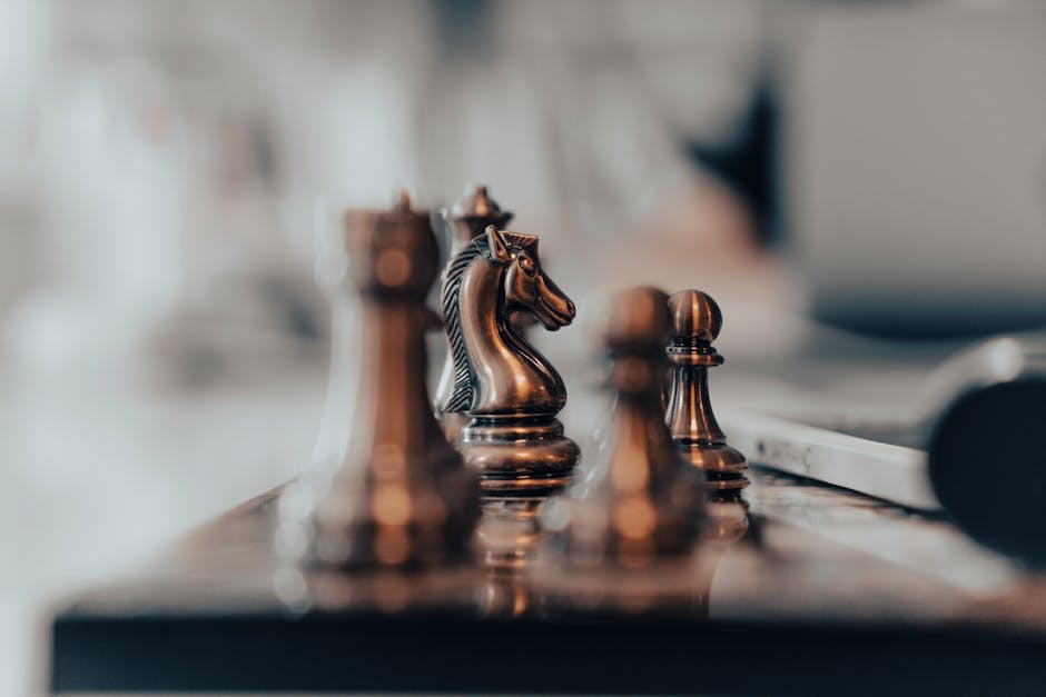 A detailed close-up of chess pieces on a board, highlighting the knight in warm tones.