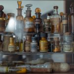 Collection of vintage apothecary bottles showcasing historical pharmaceutical storage.