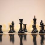 The Strategic Value of Biodiversity: Systems Thinking for Health Close-up view of chess pieces on a board in Kaduna, Nigeria.
