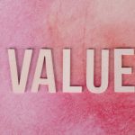 The Strategic Value of Failure in Creative Execution The word 'VALUE' in bold letters on a textured pink background.