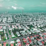 Drone view of Holon cityscape in Israel showcasing buildings and streets in a vibrant urban setting.
