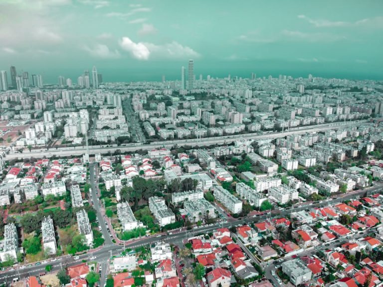 Drone view of Holon cityscape in Israel showcasing buildings and streets in a vibrant urban setting.