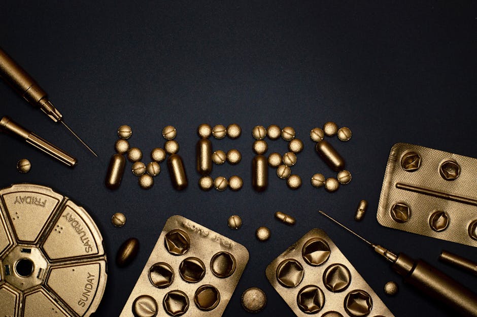 Artistic representation of healthcare with gold pills and syringes forming 'MERS' on a black background.