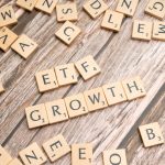 Why Dreaming Is a Strategic Asset for Technology Leaders Wooden tiles spelling ETF growth on a wooden surface, symbolizing investment strategy.