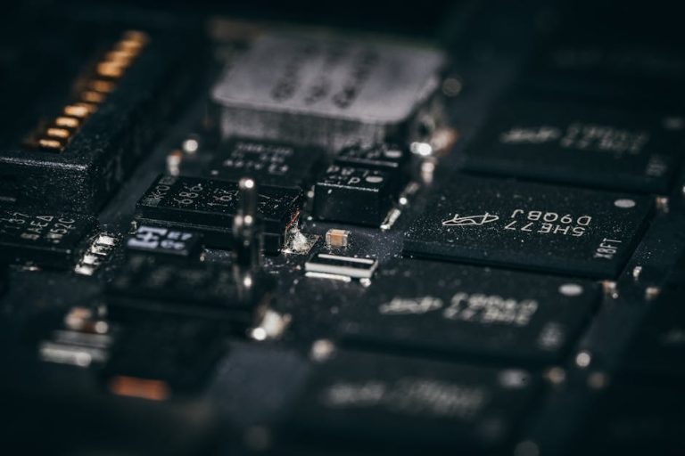 Detailed macro shot of electronic circuit components showcasing intricate design and layout.