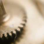 Actinide Transmutation: Turning Nuclear Waste Into Energy Detailed macro view of watch gear showcasing precision engineering and components.