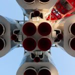 Dramatic close-up view of rocket engines, emphasizing space exploration and technology.