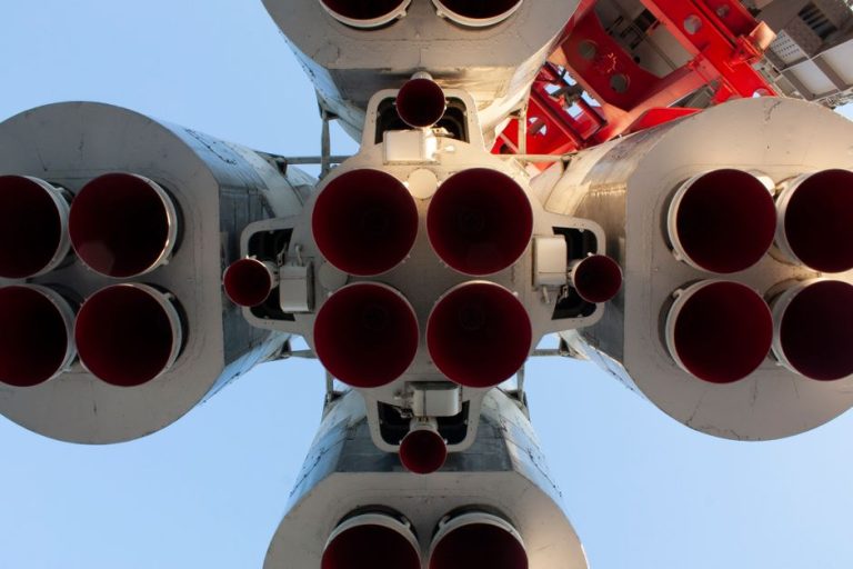 Dramatic close-up view of rocket engines, emphasizing space exploration and technology.