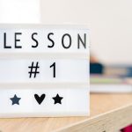 Asymmetric Advantage: Lessons from Aerospace Propulsion Tech Lightbox sign displaying 'Lesson #1' in a classroom setting, symbolizing education and new beginnings.