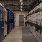 Automation and Marginal Utility: Future-Proofing Your Business A sophisticated control room filled with electrical panels and equipment for industrial purposes.