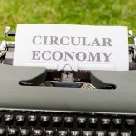 Beyond Circularity: Why Your Sustainability Strategy Is Failing Your Innovation Pipeline Classic typewriter displaying 'Circular Economy' in outdoor setting, conveying sustainability.