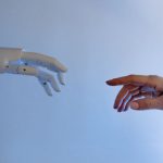 Bio-digital Integration: The Future of Executive Leadership A human hand reaching towards a robotic hand symbolizing technology and connection.