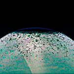 A captivating abstract image of a soap bubble resembling a surreal planet with cellular patterns.
