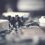 Bio-Organic Circuitry: The Future of Biological Computation Detailed view of electronic circuit components with a soft focus effect.