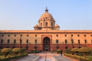 Explore the iconic Rashtrapati Bhavan with its historical architecture in sunny Delhi.