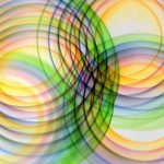 Vibrant overlapping circles create a colorful abstract pattern, radiating dynamic energy.