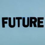 Black text 'FUTURE' on a bright blue background, symbolizing forward-looking concepts.