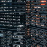 Close-up view of modern office buildings in Moscow, showcasing urban architecture at night.