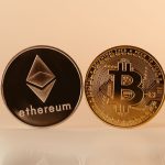 Close-up of Ethereum and Bitcoin coins representing modern digital currency and blockchain technology.