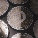 A detailed close-up view of Dash cryptocurrency coins with intricate designs highlighting digital currency.