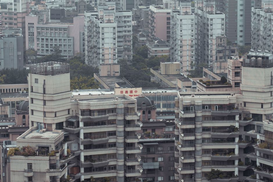Aerial view showcasing dense high-rise buildings in an urban downtown district.