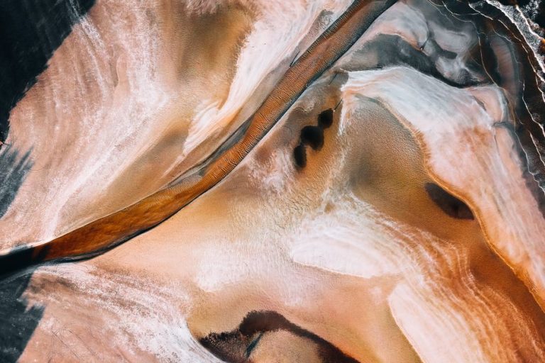 Stunning aerial view of abstract beach patterns in Kuantan, Malaysia.