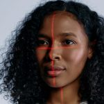Facial Recognition: Managing Regulatory Risk and Compliance A futuristic portrait of a woman with laser scanning lines on her face, representing advanced technology.