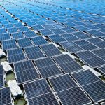Aerial view of floating solar panels in Pasir Mas, Kelantan, illustrating renewable energy technology.