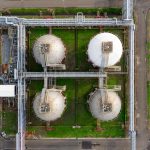 Aerial view of large industrial storage tanks in Banten, Indonesia, showcasing infrastructure and industry.