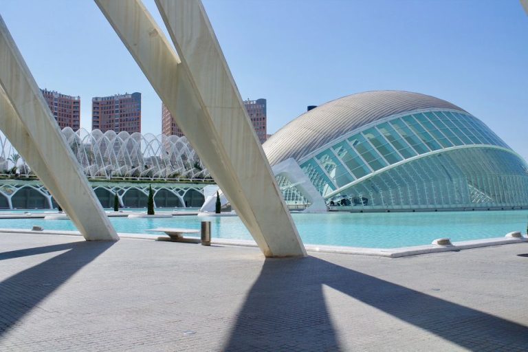 Explore the iconic City of Arts and Sciences in Valencia, showcasing stunning modern architecture and blue skies.