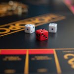 Intellectual Monopoly: Strategy Lessons from 1235-1238 History High-quality close-up photo of dice on a classic Monopoly board game, highlighting the gaming experience.
