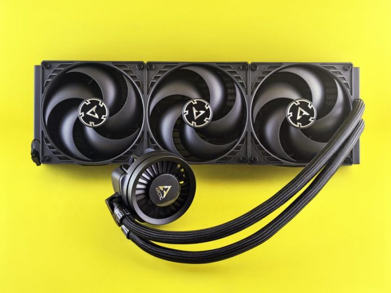 Triple fan CPU cooler with colorful background, efficient for gaming PCs.