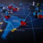 Multi-Planetary Strategy: Risk Management and Space Expansion A strategic board game featuring a world map and colorful playing pieces.