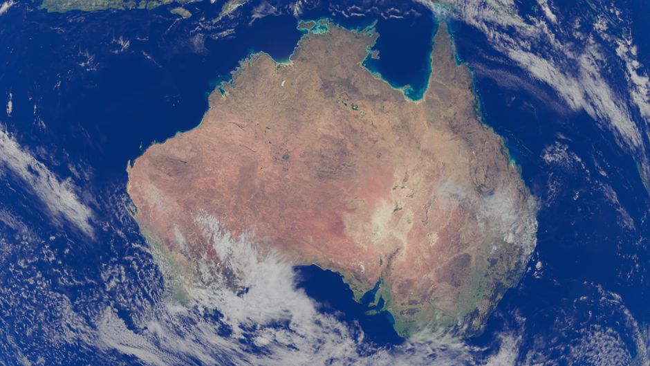 Stunning satellite image capturing Australia surrounded by deep blue ocean waters.