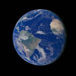 Vibrant view of Earth from space, highlighting continents against the deep blue ocean.