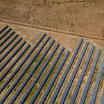 Scaling Carbon Capture: Strategy for Industrial Carbon Economy Aerial shot of solar panels in De Aar, illustrating sustainable energy in South Africa.