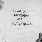 A motivational message on paper surrounded by crumpled sheets, symbolizing focus amidst chaos.