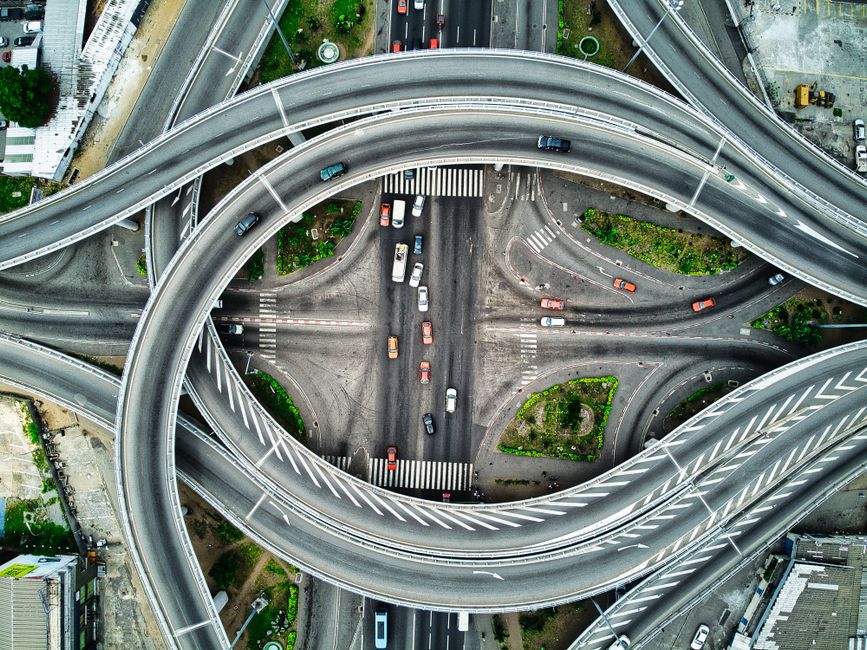 Drone shot of a complex highway interchange in Abidjan, showcasing modern urban infrastructure.